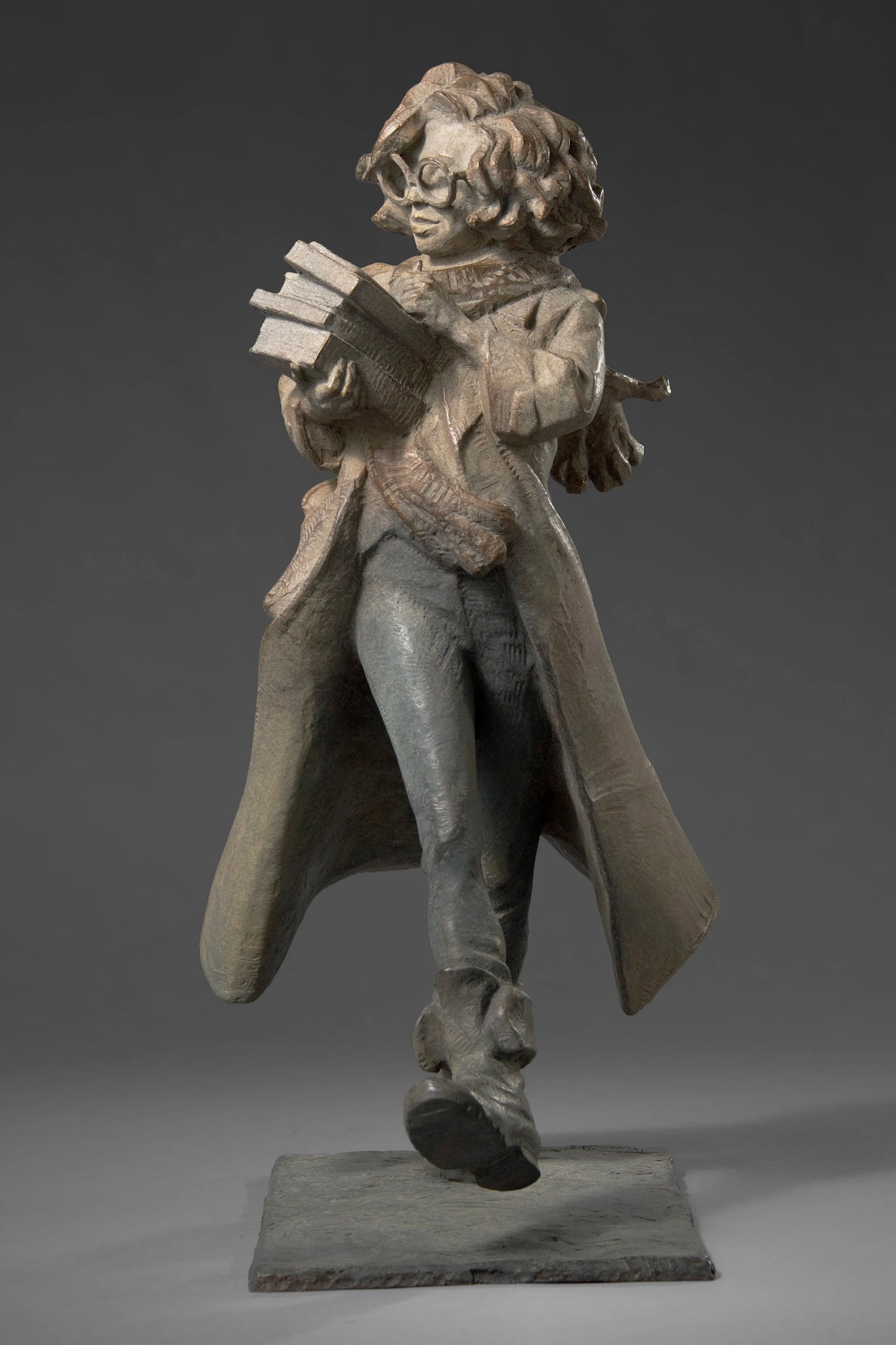 Woman Carrying Books