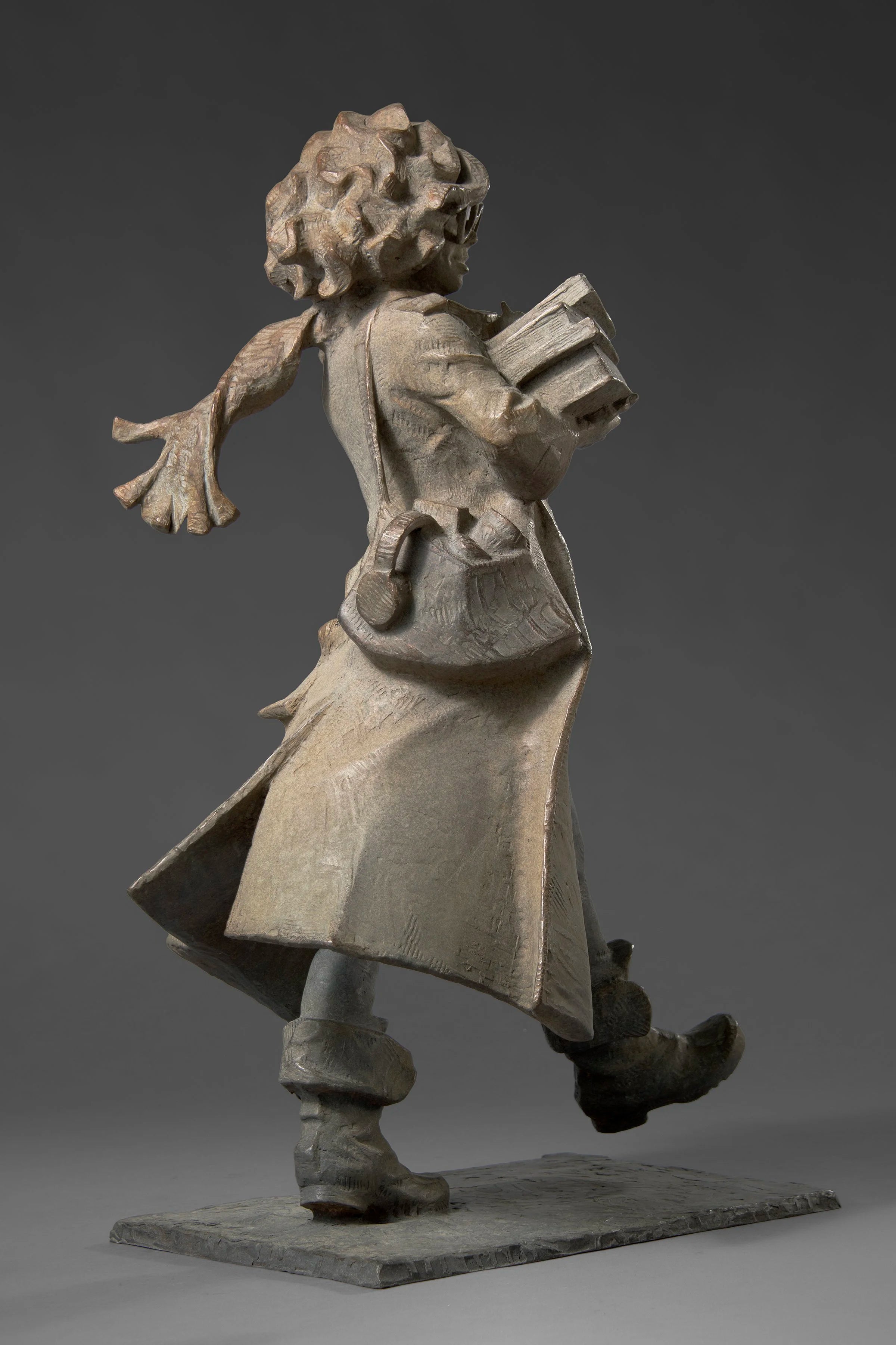 Woman Carrying Books
