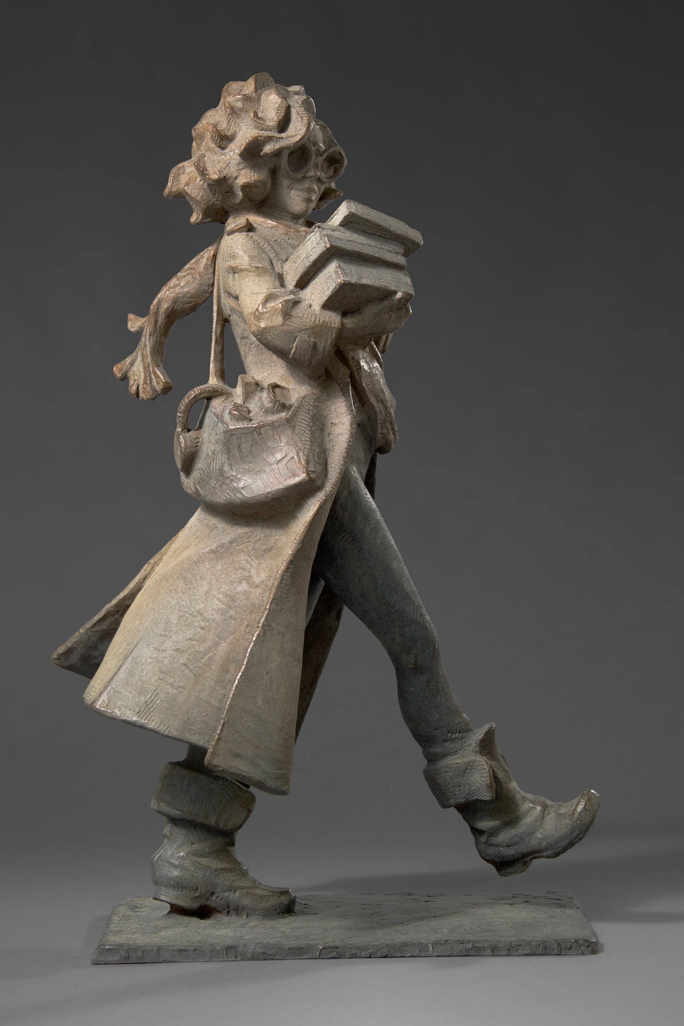 Woman Carrying Books