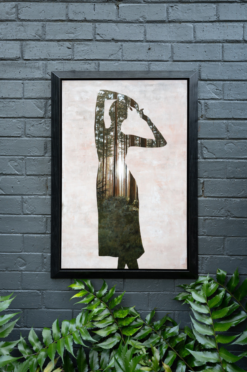 Sunlit Dance, painting of dancing silhouette in a sunny forest by Megan Aline, framed on wall