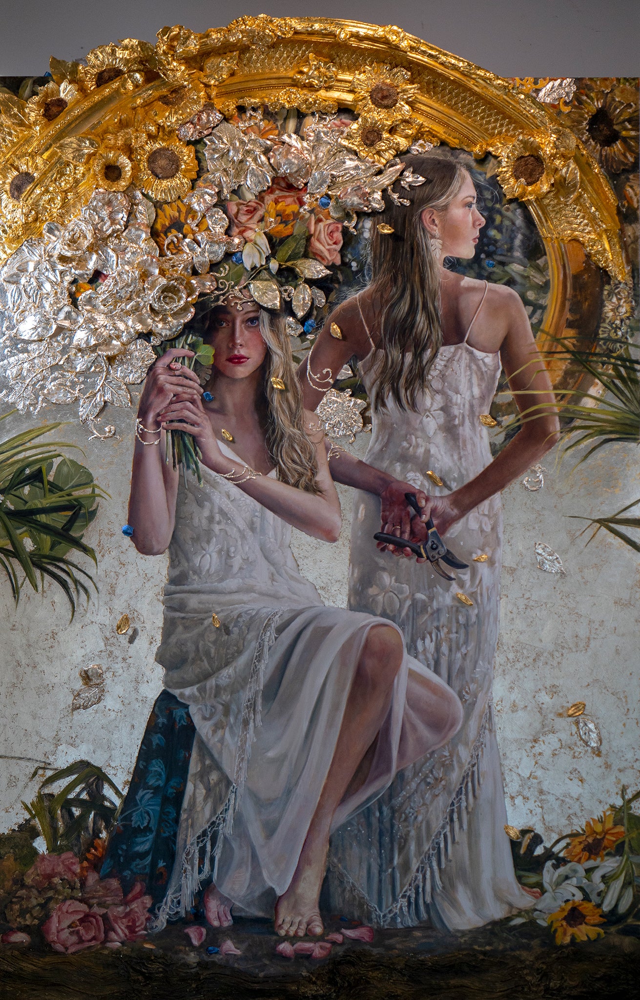 two women in white dresses painting